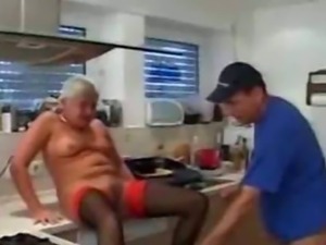 Grey Haired Granny In Red Top Stockings Cleans Up