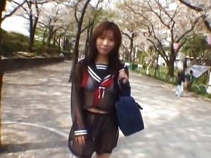 Asian schoolgirl enjoys outdoors