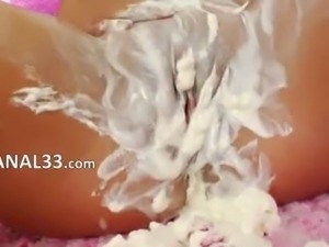 Whipped cream in her opened ass