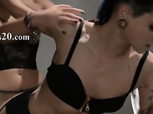 Tatto lezzies enjoying sex with strap on