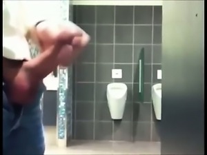 Hung Uncut Cock in Public Toilet