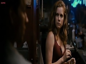 Amy Adams in a see-through black bra that clearly shows her