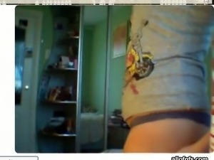 Cute blonde college girl is bored on webcam in her dorm room
