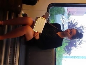 Arab beauty on the train - sexy legs and feet - curly hair