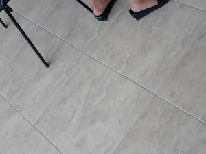 Candid shy feet in sandals