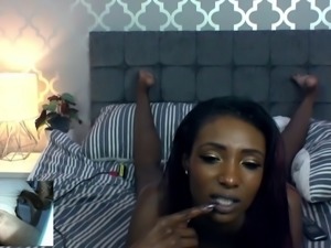 Ebony beauty worships big white cock on cam
