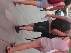 Tight ass in grey shorts .candid vid