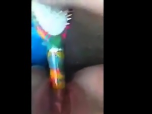 Teen fucking herself with hairbrush