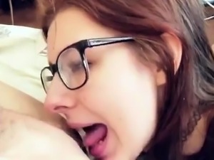 Nerdy redhead chokes on a cock before getting anally drilled