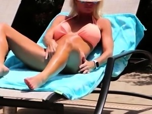 Big breasted blonde mom rides her favorite toy under the sun