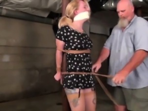 Sultry blonde milf with sexy legs gets tied up and suspended