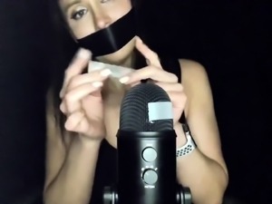 Sensual brunette teen expressing her passion for duct tape