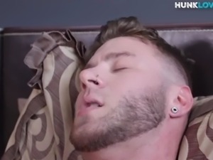 Tattooed stud jerks off for a cum shot during solo action