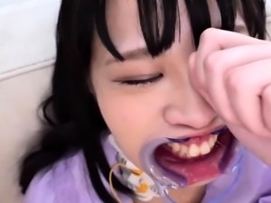 Freaky Asian teen reveals her amazing deepthroating skills