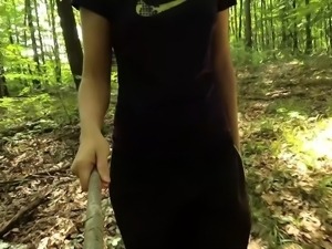 Naughty girl with small tits gets fully naked in the woods