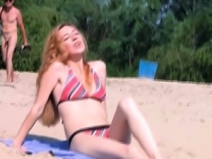 Cute nude beach girl caught on a hidden camera