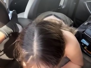 Cum starved brunette sucks off big black cock in the car